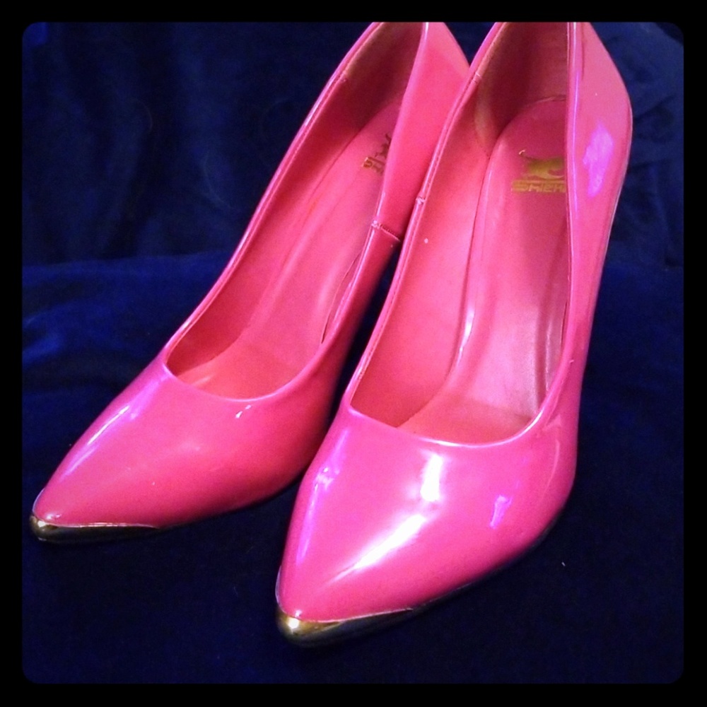 Hot pink vinyl pumps. Size 7.  Heel 3.5 inch